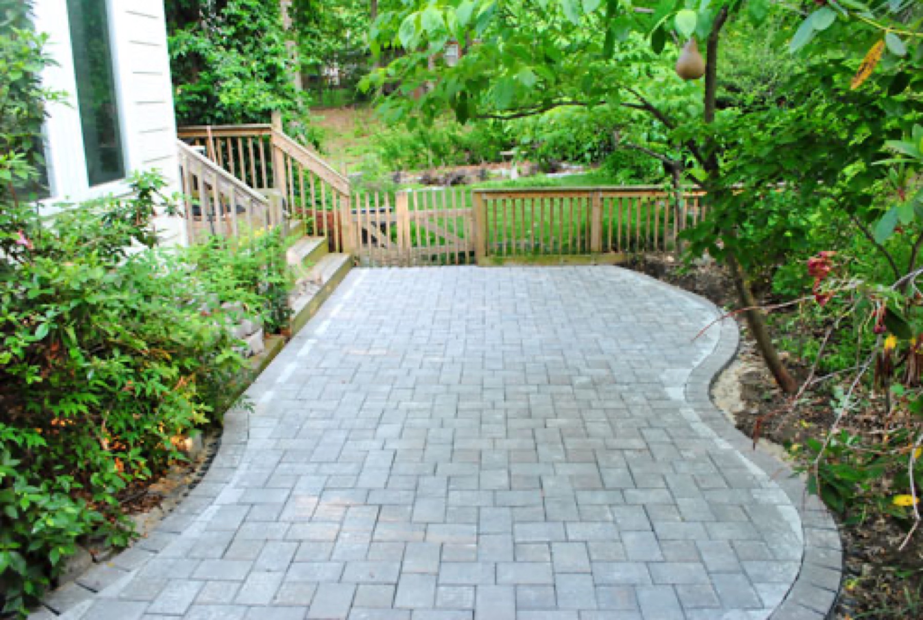 Paver patio installation by Precision Property Works