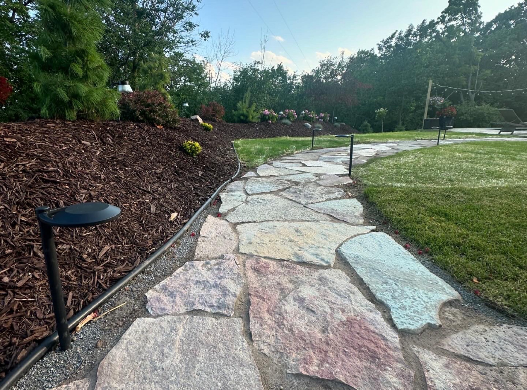 Walkway and hardscape detail around a property